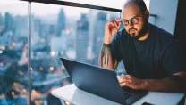 man working at computer