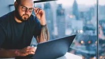 man working at computer