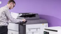 A man using an MFP