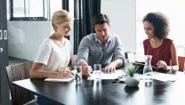 Group of colleagues collaborating in a boardroom