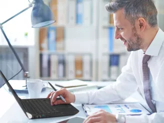 man working at computer