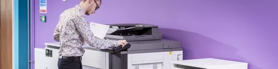 A man using an MFP